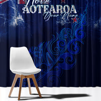 Blue curtain panel with stylized NZ map, silver fern, stars and decorative scrollwork