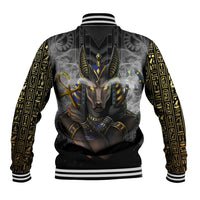 Unisex black baseball jacket with Anubis chest graphic and gold hieroglyph sleeve print