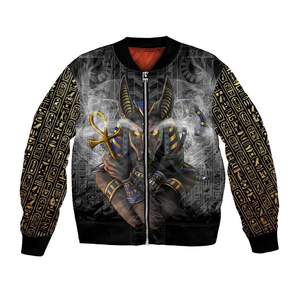 Unisex bomber jacket in black with Egyptian anubis graphic and gold hieroglyph sleeves