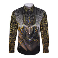 Black long-sleeve button shirt with Anubis face front graphic and gold hieroglyph panels