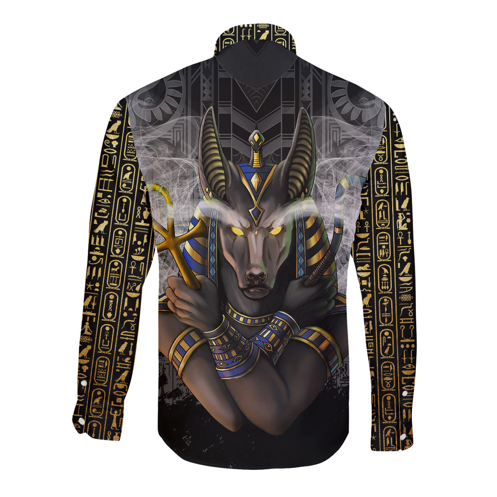 Black long-sleeve button shirt with Anubis face graphic and gold hieroglyph sleeve stripes