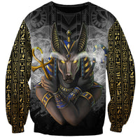 Black unisex sweatshirt with large Anubis-style front graphic and gold hieroglyph sleeves