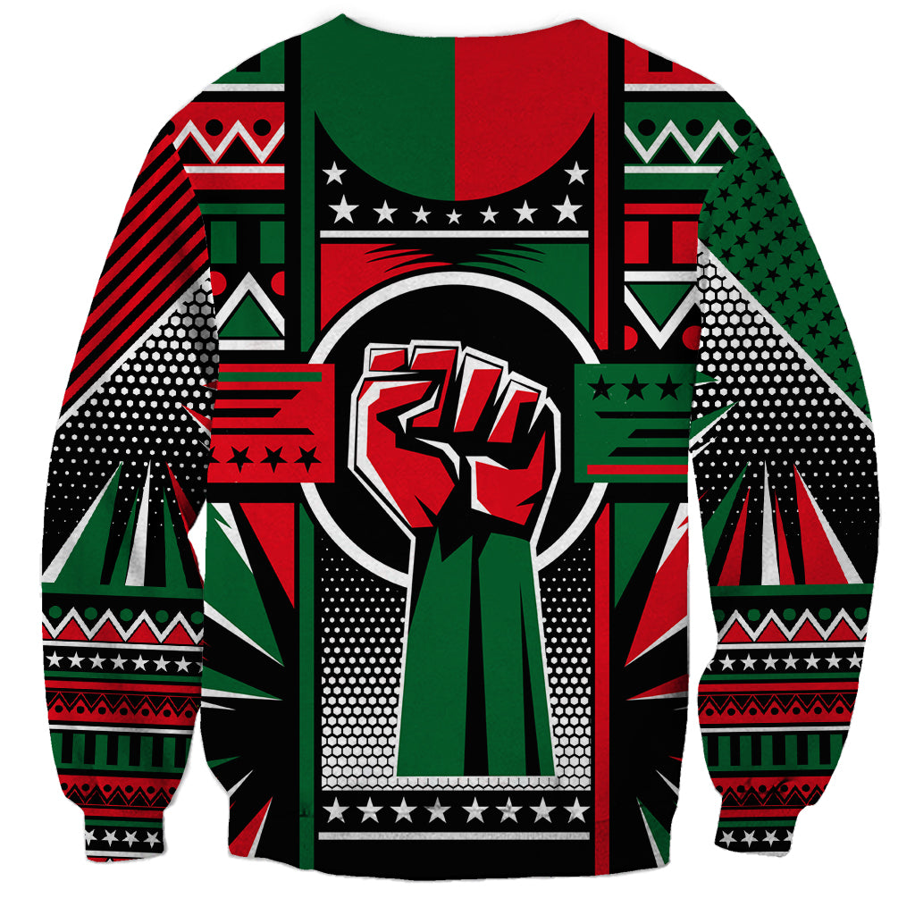 Crew-neck unisex sweatshirt with graphic fist emblem and vibrant geometric patchwork
