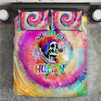 Tie-dye bedding set with two matching pillowcases and colorful skull graphic on duvet