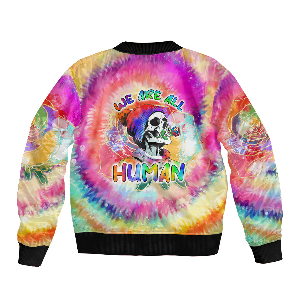 Unisex tie-dye bomber jacket with back skull graphic and 'WE ARE ALL HUMAN' text