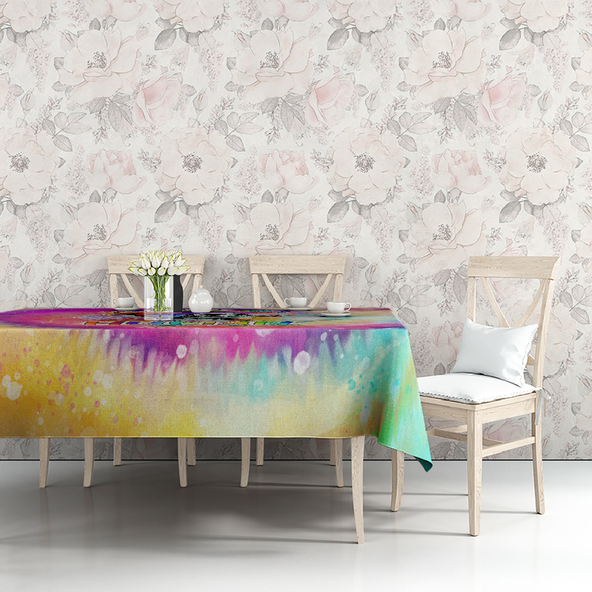 LGBT tie-dye tablecloth with rainbow drip pattern, neatly draped on dining table