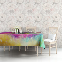 LGBT tie-dye tablecloth with rainbow drip pattern, neatly draped on dining table