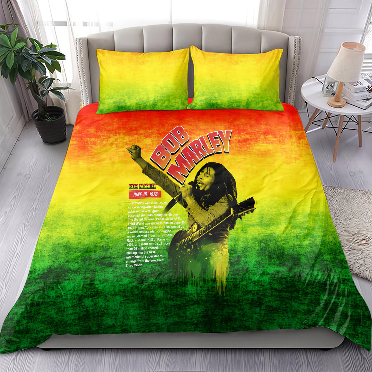 Bob Marley bedding set on bed, green-yellow-orange duvet with Bob Marley logo