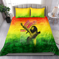 Bob Marley bedding set on bed, green-yellow-orange duvet with Bob Marley logo