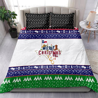Christmas bedding set with navy star pillowcases, blue patterned band, green tree border, white panel