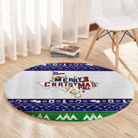 Round Christmas rug with 'Merry Christmas y'all' center print, blue patterned ring and green trees