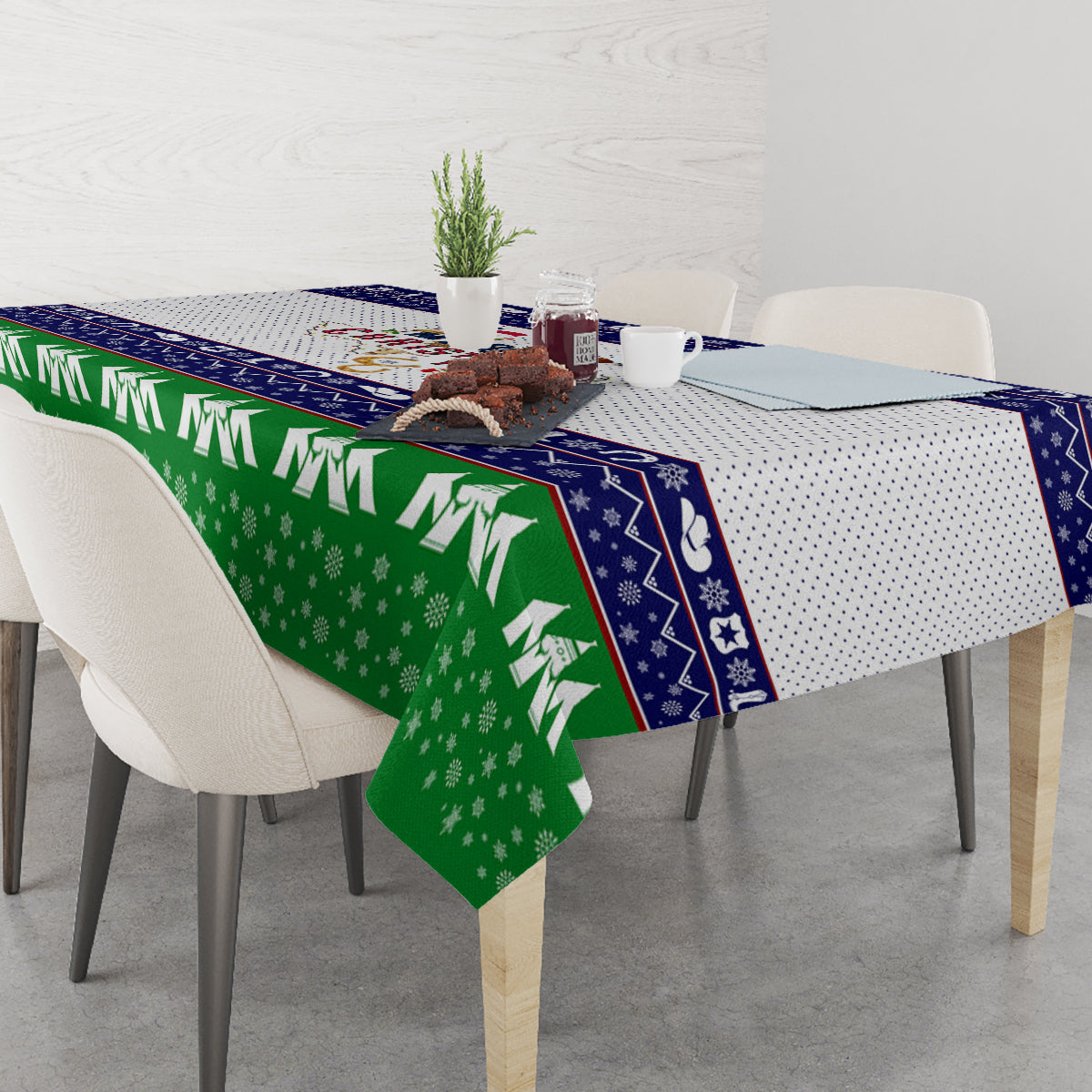 Rectangular Christmas tablecloth with green snowflakes, navy border, and white dotted center