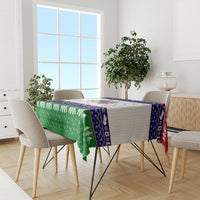 Christmas tablecloth on dining table: green snowflake fabric with navy stripe and white dots