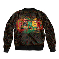 Black bomber jacket with ribbed hem and colorful African Power graphic on back