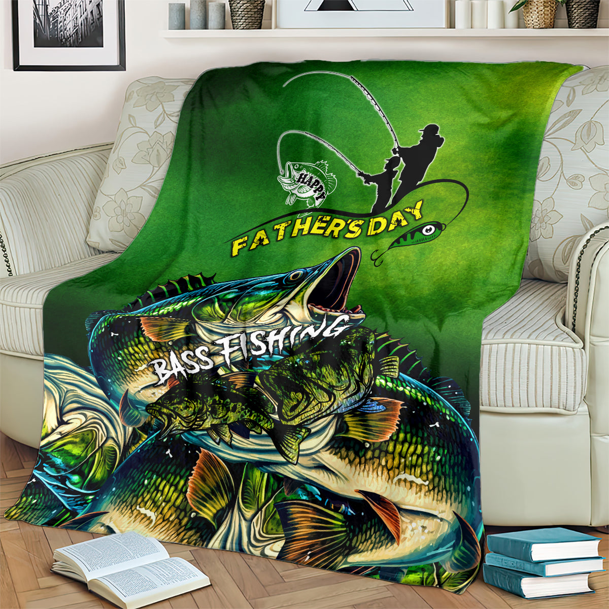 Green bass fishing Father's Day blanket on couch, fisherman silhouette and detailed bass image