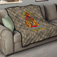 Grey quilt for sofa with firefighter crest and “Makes the Best Dad” text