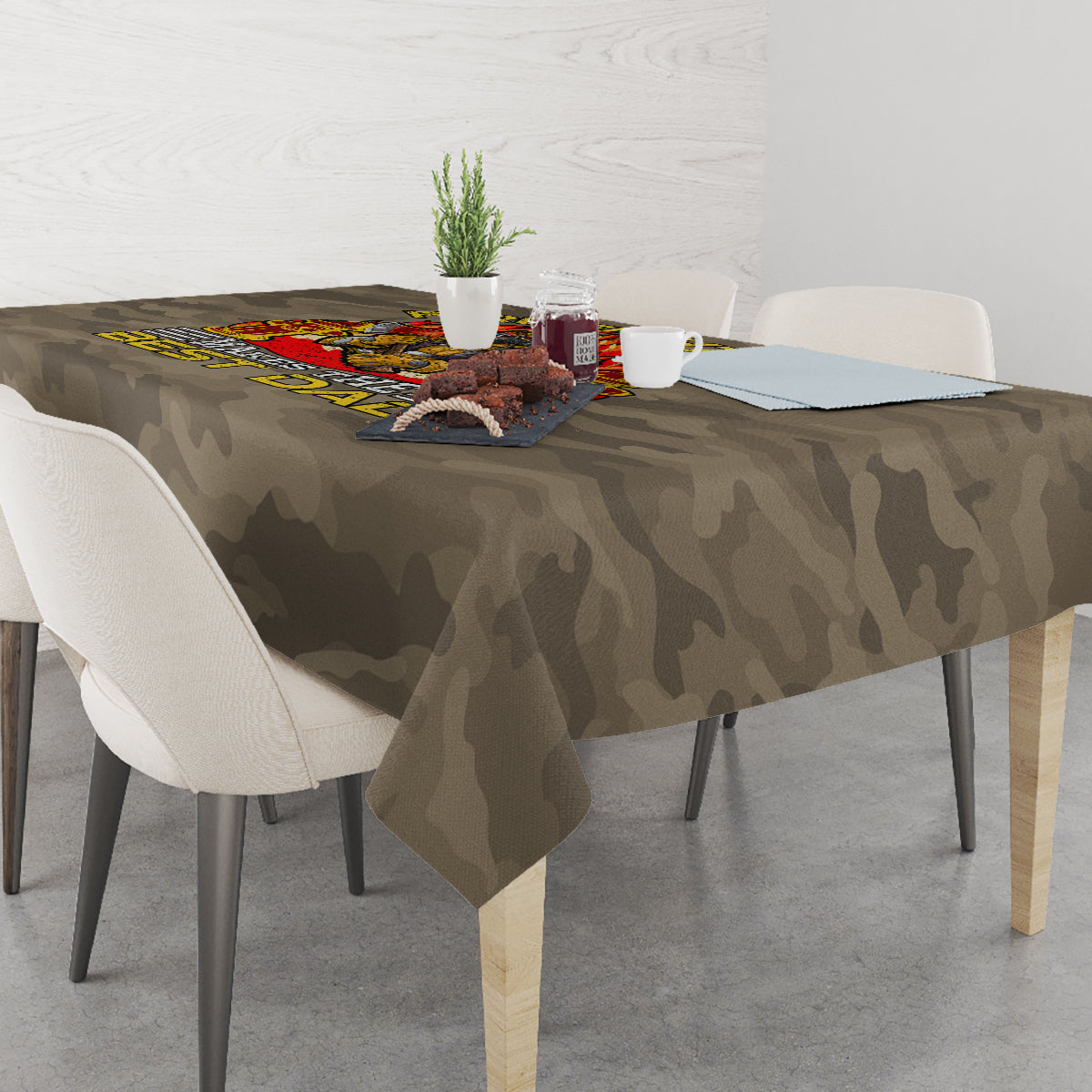 Camo firefighter “Best Dad” tablecloth on a dining table with small centerpiece on top