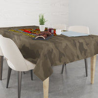 Camo firefighter “Best Dad” tablecloth on a dining table with small centerpiece on top