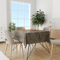 Camo firefighter “Best Dad” tablecloth on a round dining table with chairs