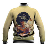 Beige baseball jacket with striped ribbed hem and back graphic 'God's Masterpiece' with cross