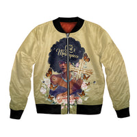 Unisex beige bomber jacket with front zip and ribbed cuffs, colorful faith graphic on chest