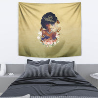 Beige wall tapestry with African woman portrait, gold cross, and floral frame artwork