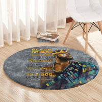 Round dark gray rug with lion graphic, multicolor pattern, and gold inspirational text