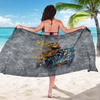 Gray sarong wrap with gold king print and colorful patterned side panel