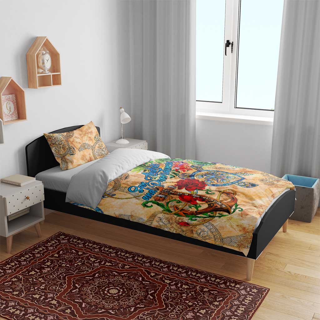 Orange tropical bedding set on bed with two pillowcases and matching duvet