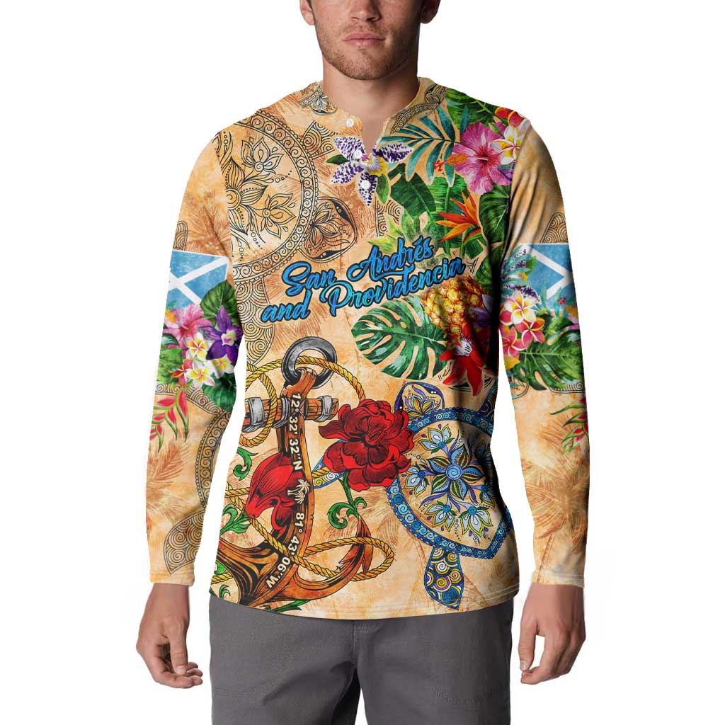 Orange tropical button sweatshirt shown on model, long sleeves with floral anchor print