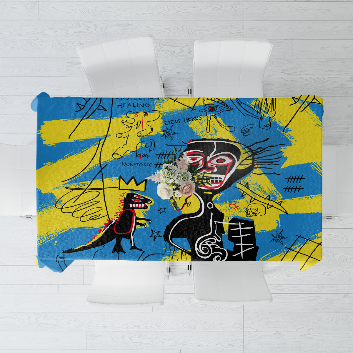 Psychedelic blue and yellow tablecloth with bold face and graffiti-style symbols