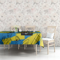 Psychedelic blue and yellow tablecloth with eye motif and sketchy line art