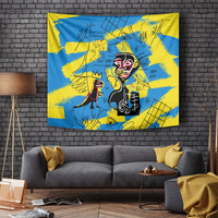 Psychedelic wall tapestry in blue and yellow with red-face character and abstract line art