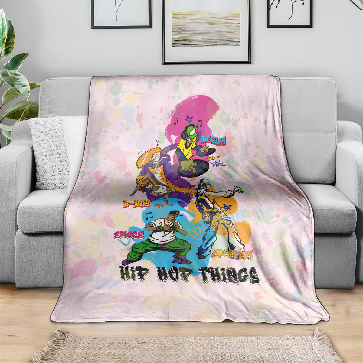 Light pink hip hop themed throw blanket with colorful character art and dark lettering