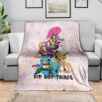 Light pink hip hop themed throw blanket with colorful character art and dark lettering