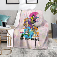 Light pink hip hop themed blanket with colorful characters and dark lettering