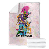 Light pink hip hop themed blanket shown folded with colorful character graphic