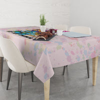 Hip hop tablecloth on dining table, corner view with multicolor graffiti and splatter