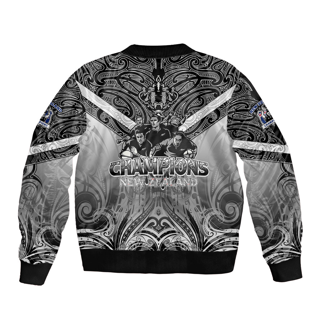 Black unisex bomber jacket with ornate paisley print and Champions graphic on back