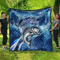 Blue ocean waves quilt featuring striped bass graphic with quilted diamond texture.