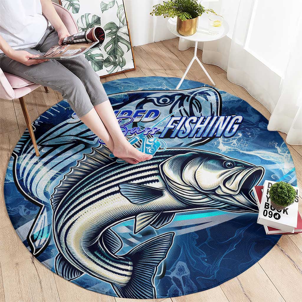 Blue round fishing carpet with striped bass graphic, wave design, and fishing wordmark