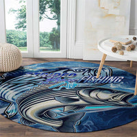 Blue round striped bass fishing rug with bold fish illustration and swirling wave design