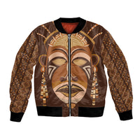 Bomber jacket with tribal mask face print, brown/gold satin look, zip front, ribbed hem