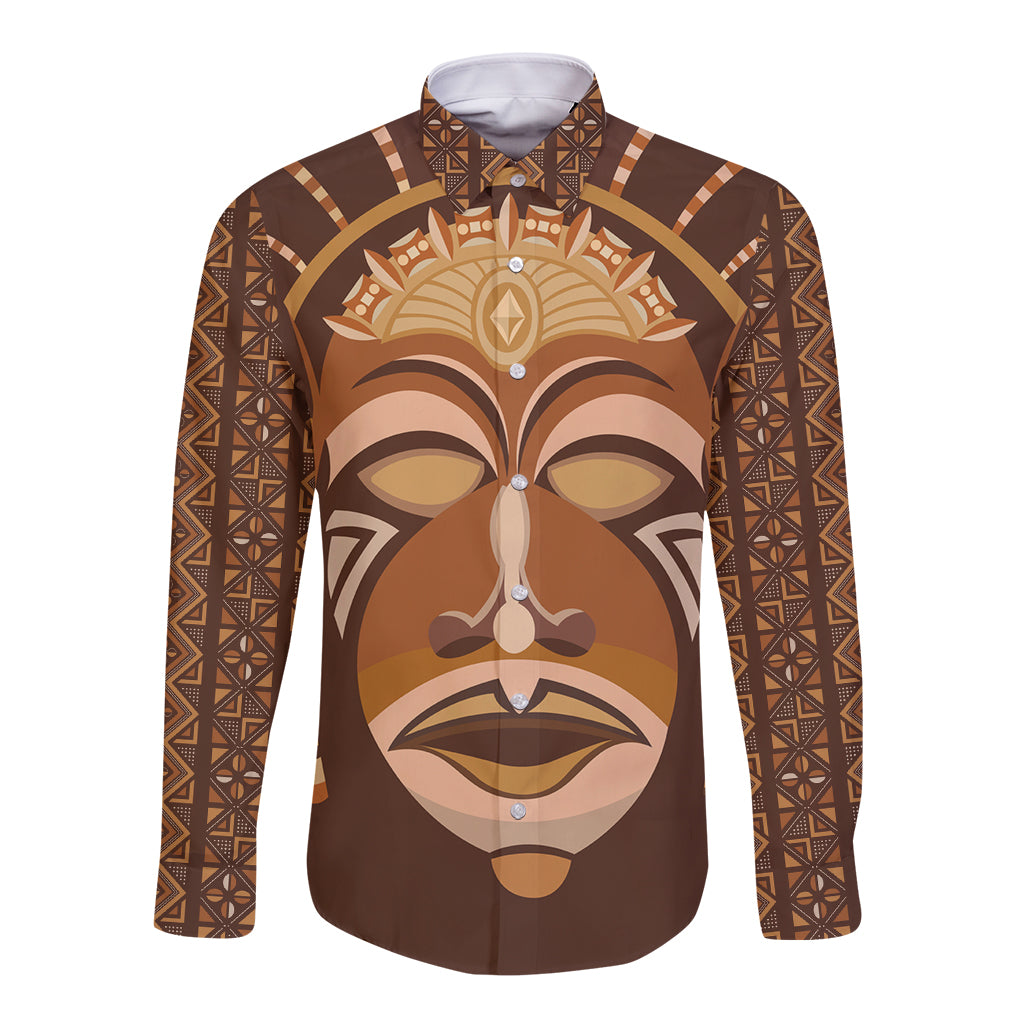 Long-sleeve button shirt in brown with tribal face mask print, front view.