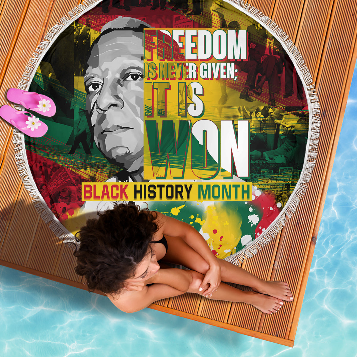 Round beach blanket laid flat with fringe edge and Black History Month portrait text graphic