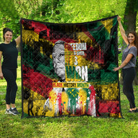 Quilt featuring grayscale face artwork, red-green-yellow blocks, and “Black History Month” text