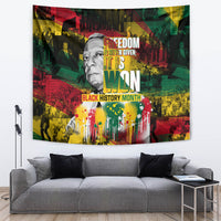 Multicolor wall tapestry with portrait and bold text, paint-drip design