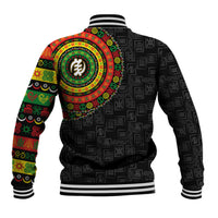Black baseball jacket with allover Adinkra symbol print, large circular emblem on back
