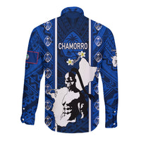 Blue long-sleeve button shirt with Chamorro text, palm accents, and tribal pattern