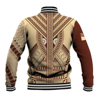 Back of beige baseball jacket with brown tapa pattern, ribbed striped cuffs and hem